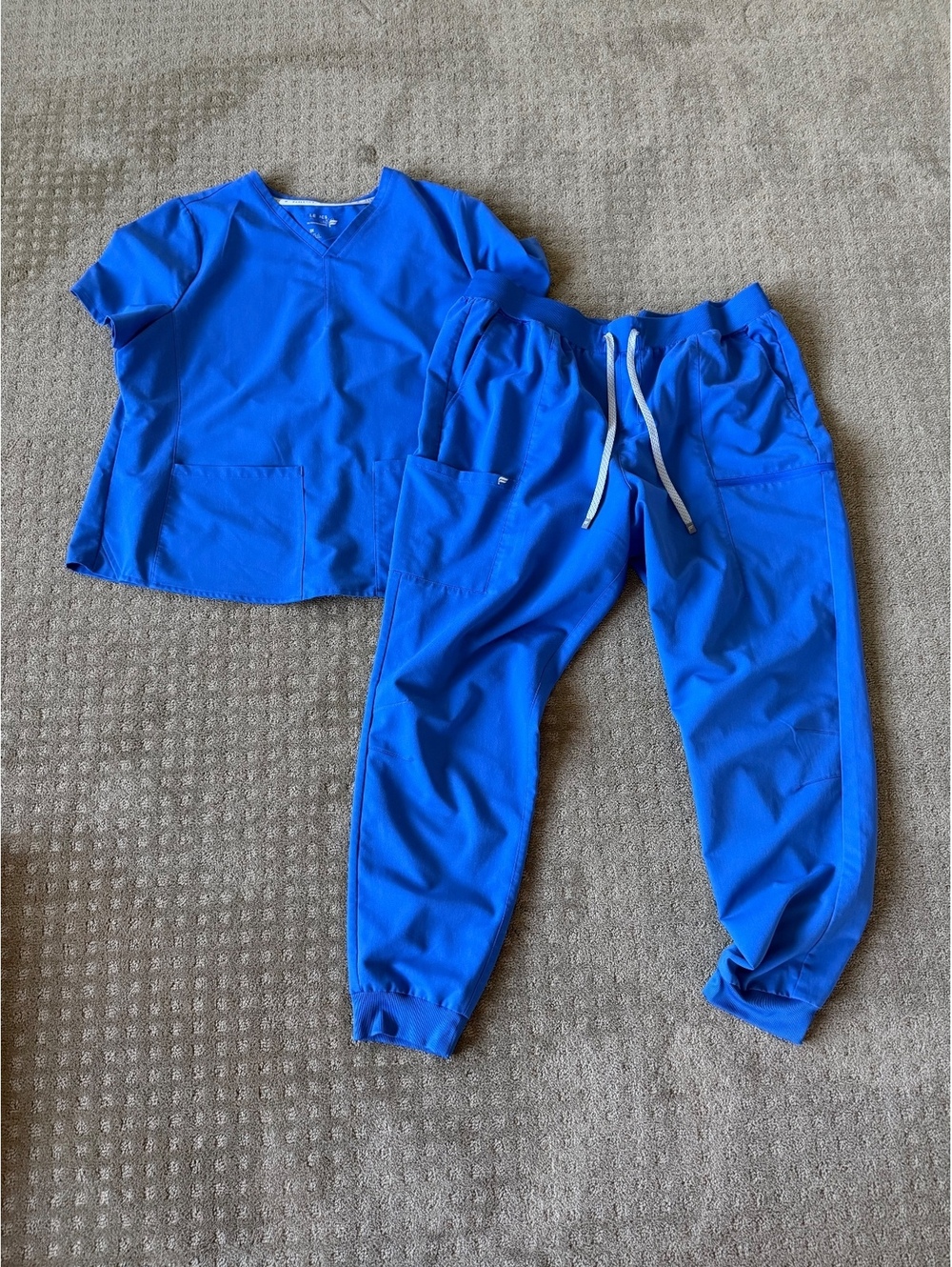 Blue Two-Piece Medical Scrub Set with Drawstring Pants and V-Neck Top